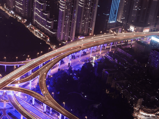 Supported and managed domains Aerial image of road junction at night