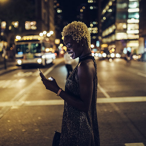 Online services Woman on phone at night