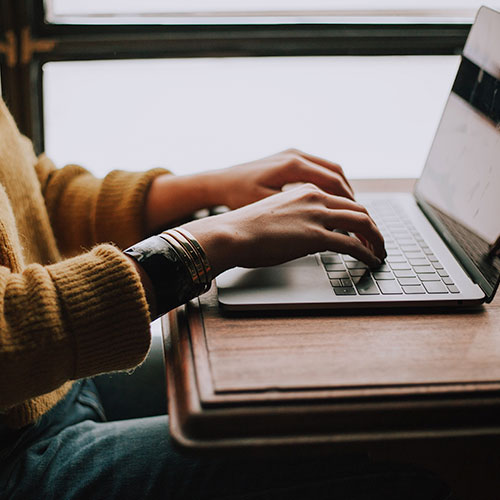 WHOIS lookup Woman using laptop
